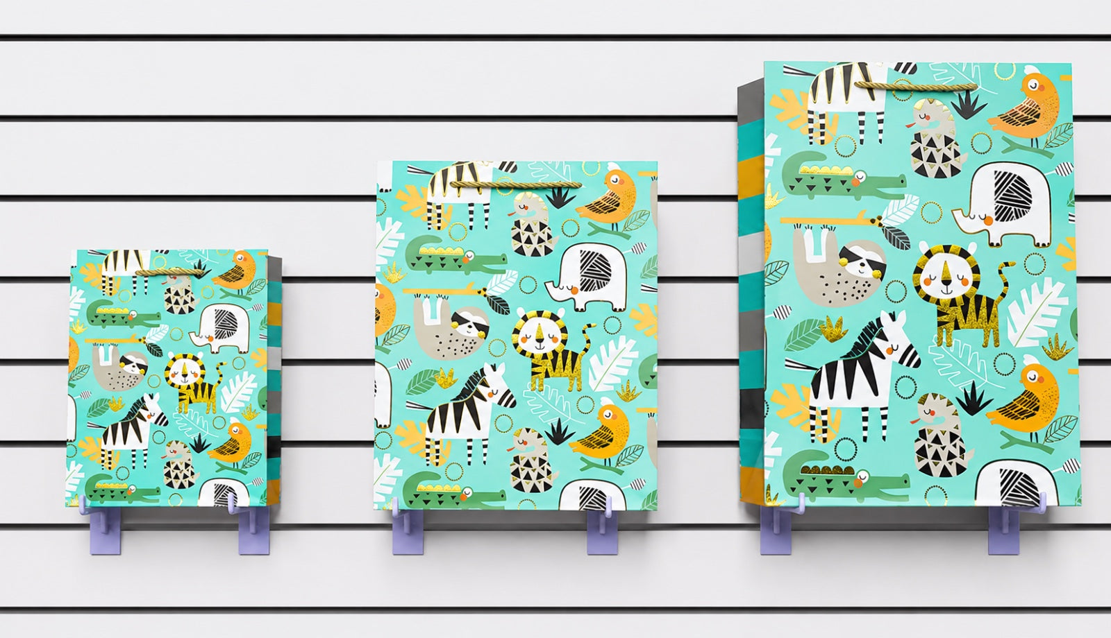 Bolsas de regalo modelo 677 con ilustraciones coloridas de animales y escenarios de aventura. Disponibles en tamaños chica, mediana y grande. Importación directa ROGLUX.
